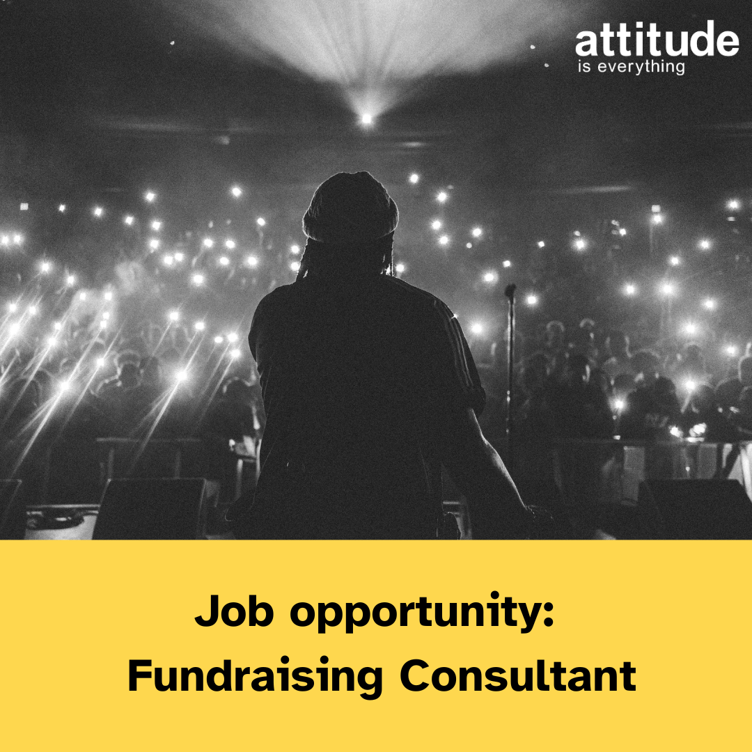 Job opportunity: fundraising consultant. Image shows a person performing to a crowd with lights - black and white